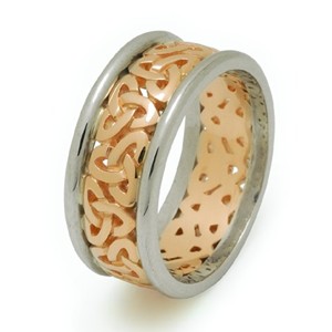 14kt Trinity knot Gold band Ring with white gold rims.